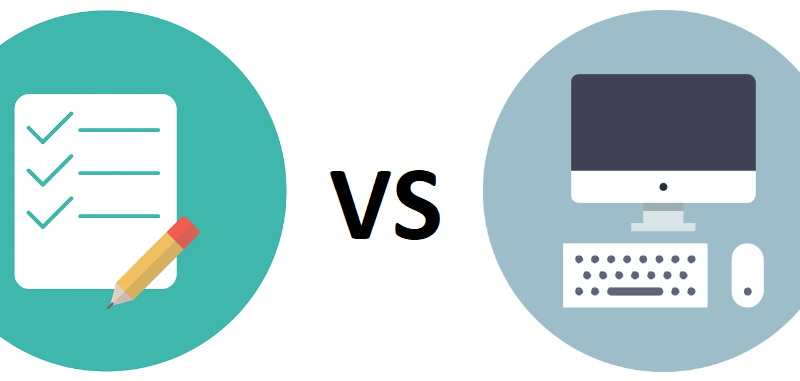 Two circular icons: on the left, a checklist and pencil symbolize IELTS on Paper; on the right, a desktop computer, keyboard, and mouse represent IELTS on Computer. The letters VS appear between them, highlighting the comparison.