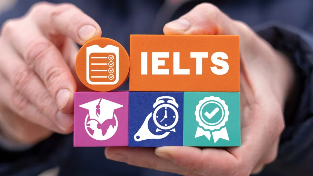 A hand holds colorful blocks featuring icons representing IELTS preparation, education, time management, and certification.